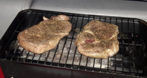 Ribeye steaks on the grill